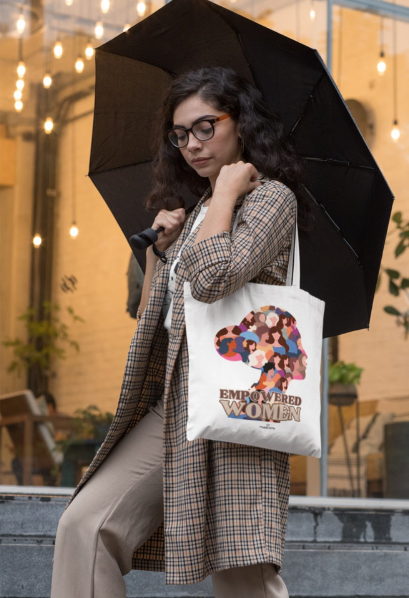 a beautiful lady carrying  a printed tote bag of trendyatri