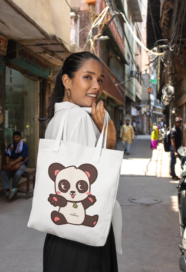 A lady holding a tote bag of Trendyatri 